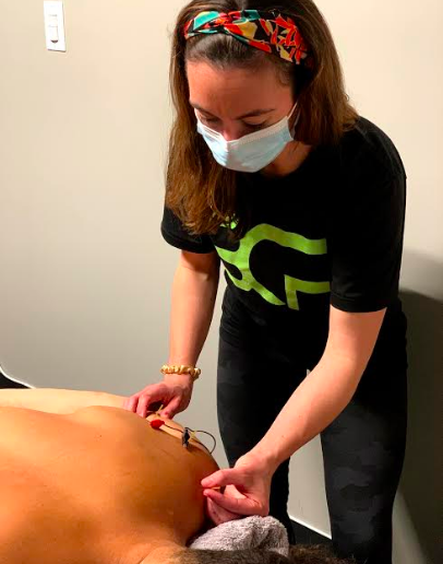 Dry needling treatment being performed in the BronCore Fitness Recovery Room