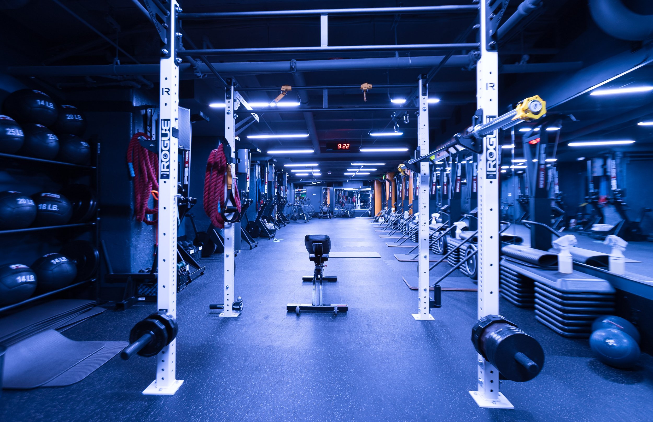 The BronCore Fitness training floor with racks and turf